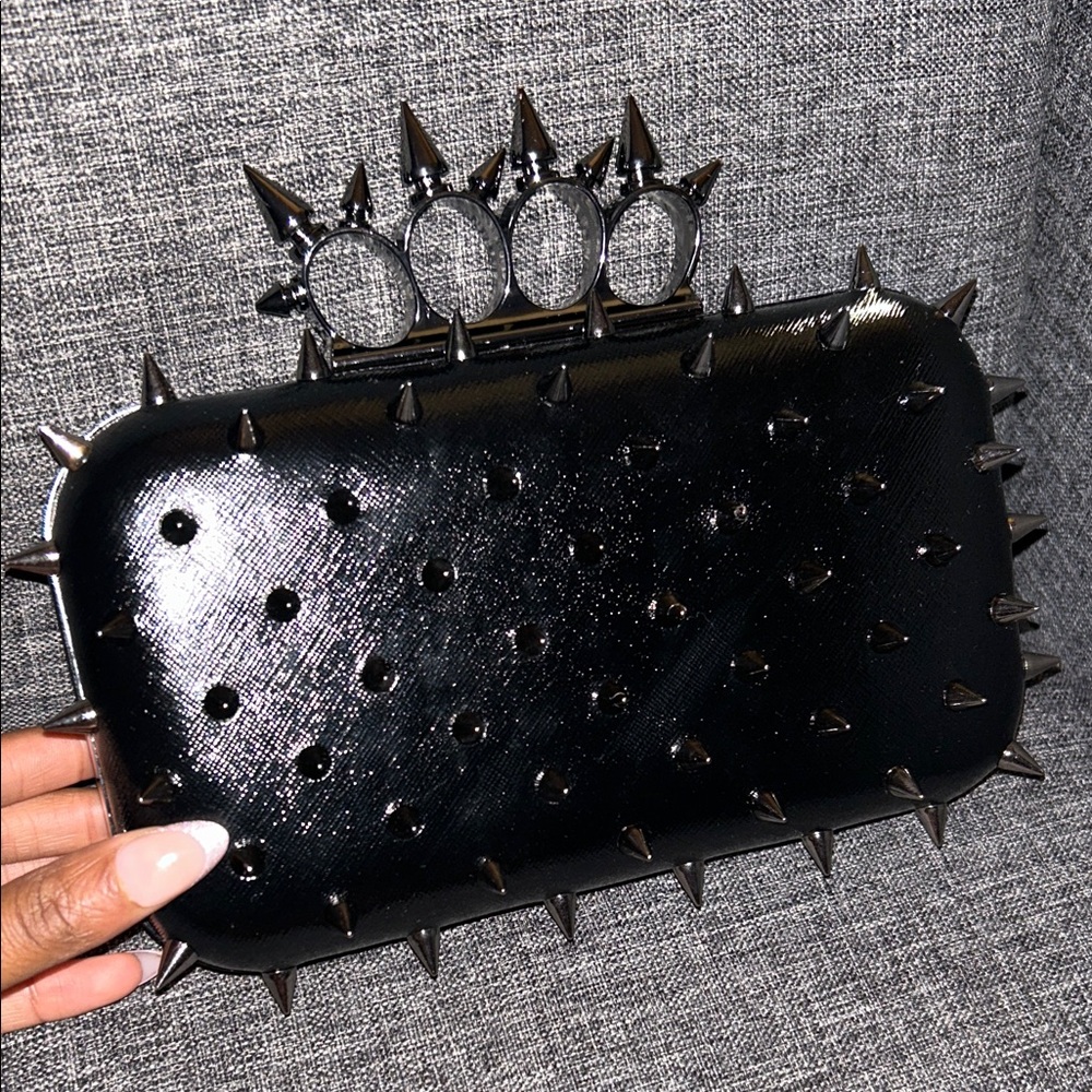 TKO limited edition spiked Clutch